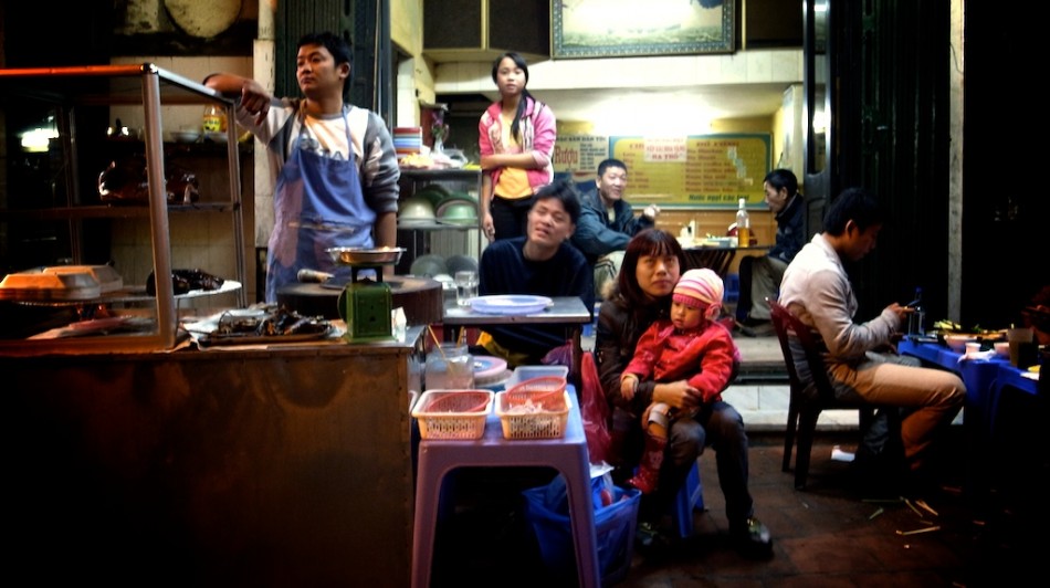 eating a dog meat meal in Hanoi, Vietnam
