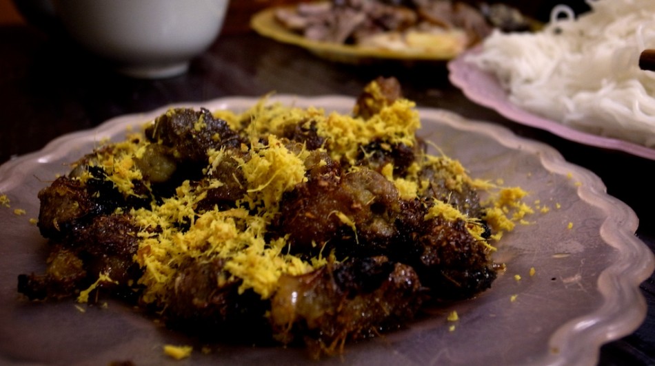 eating a dog meat meal in Hanoi, Vietnam